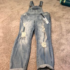 light washed ripped overalls